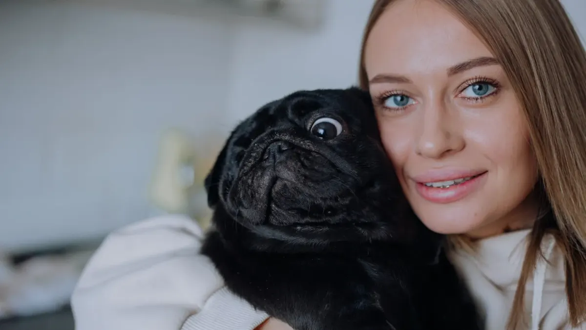 Dog in kitchen with owner