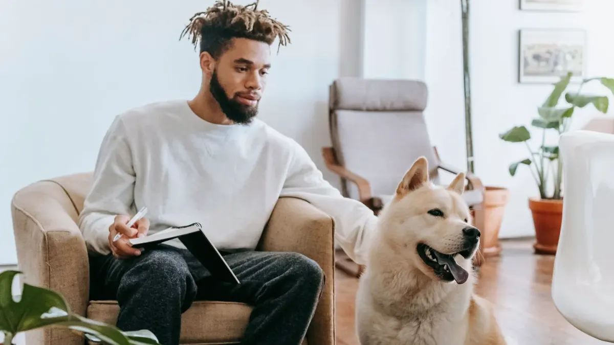 Dog in kitchen with owner